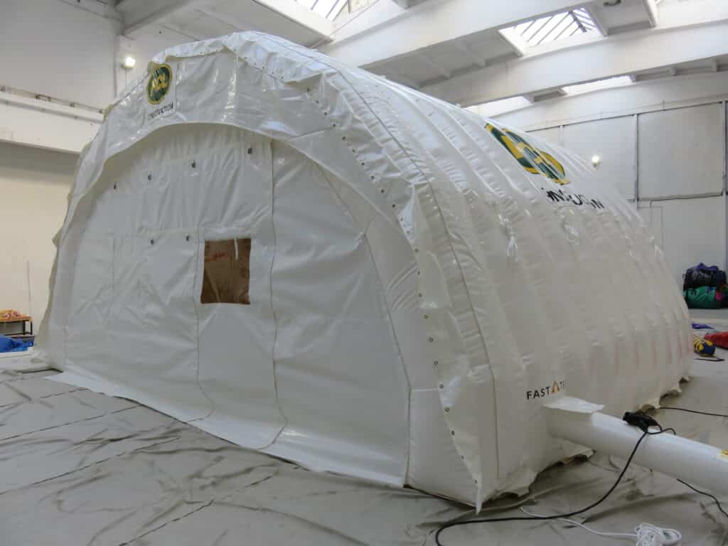 White PCL-branded Njordair Fast Tent deployed for winter construction works in Breckenridge, Colorado