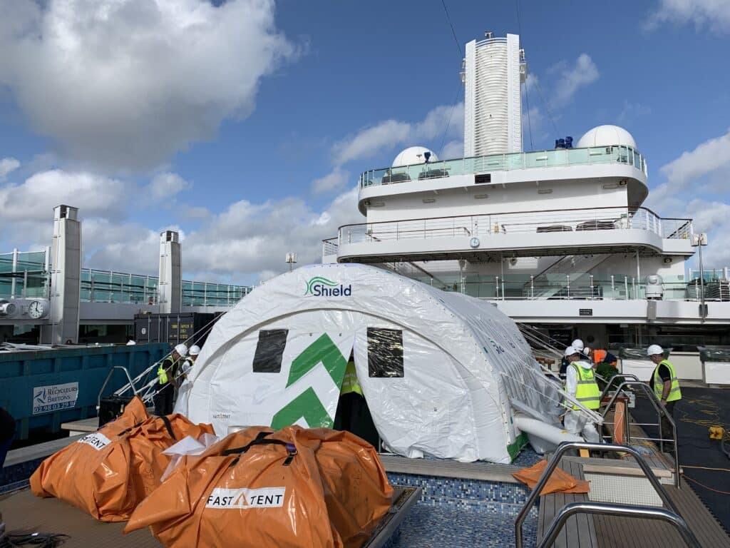 Shield-branded Njordair Fast Tents covering the pool areas on the cruise ship deck during refurbishment