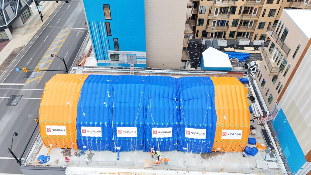 Njordair inflatable enclosure covering a rooftop pool construction site on a Columbus, Ohio apartment building