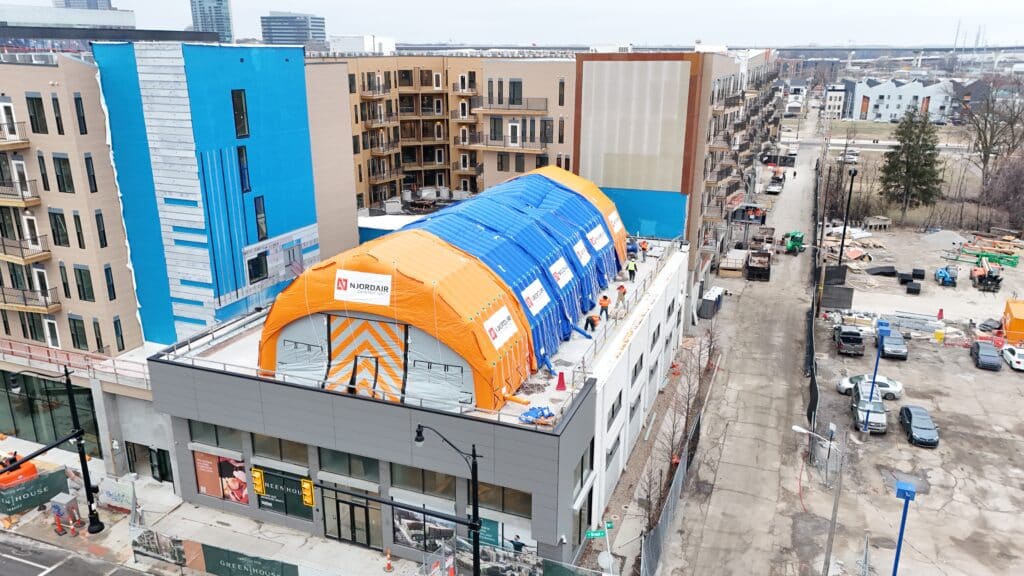 Aerial view of connected Njordair modules enclosing the rooftop pool deck in Columbus