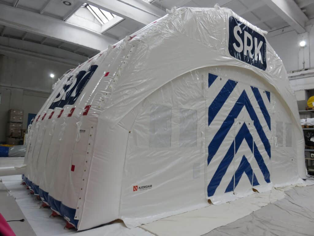White Njordair Constant Air tent with custom SRK branding